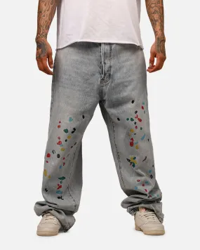 MNML Ultra Baggy Paint Splat Denim Jeans Light Blue